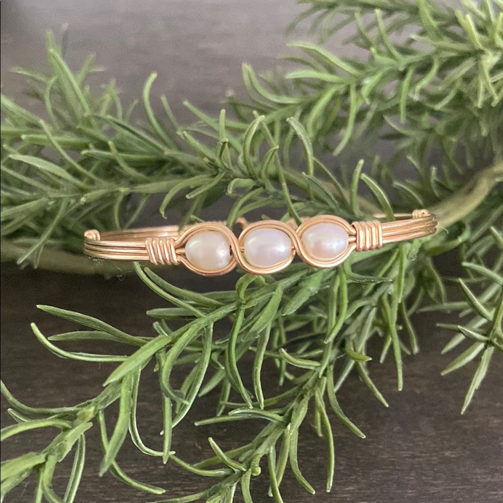 Gold and Cream Wire-Wrapped Bracelet with Intricate Design